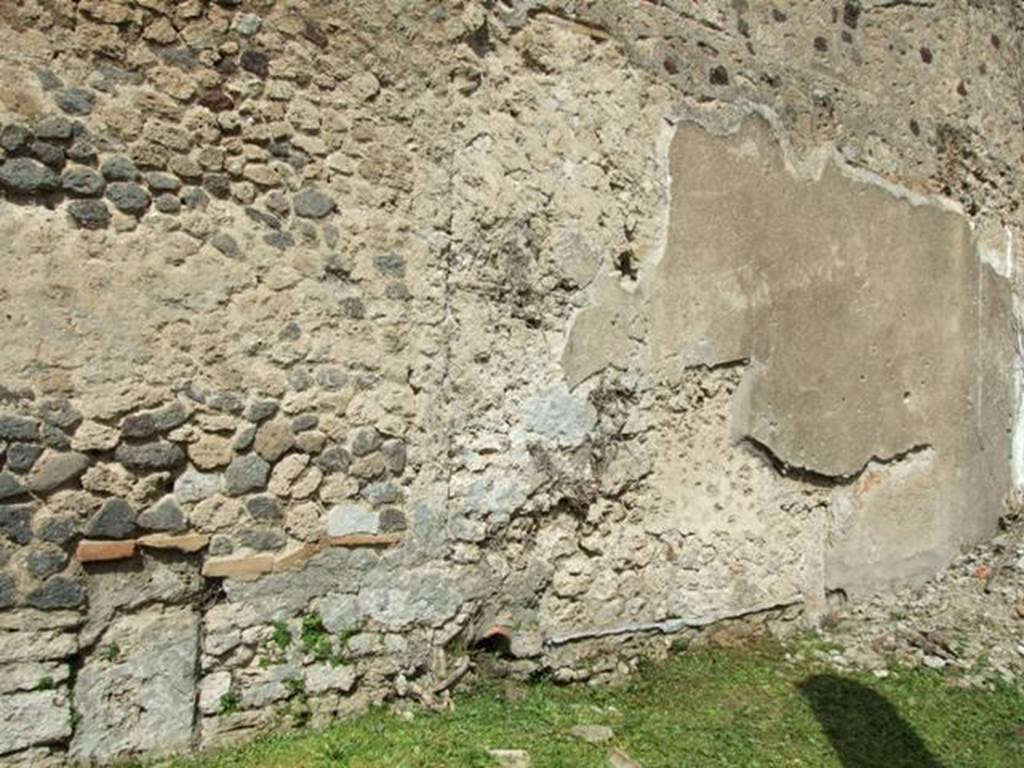 VI.15.6 Pompeii. March 2009. Room 1, north wall of atrium. Looking north-east. The remains of the stairs can be seen on the right of the photo. 
