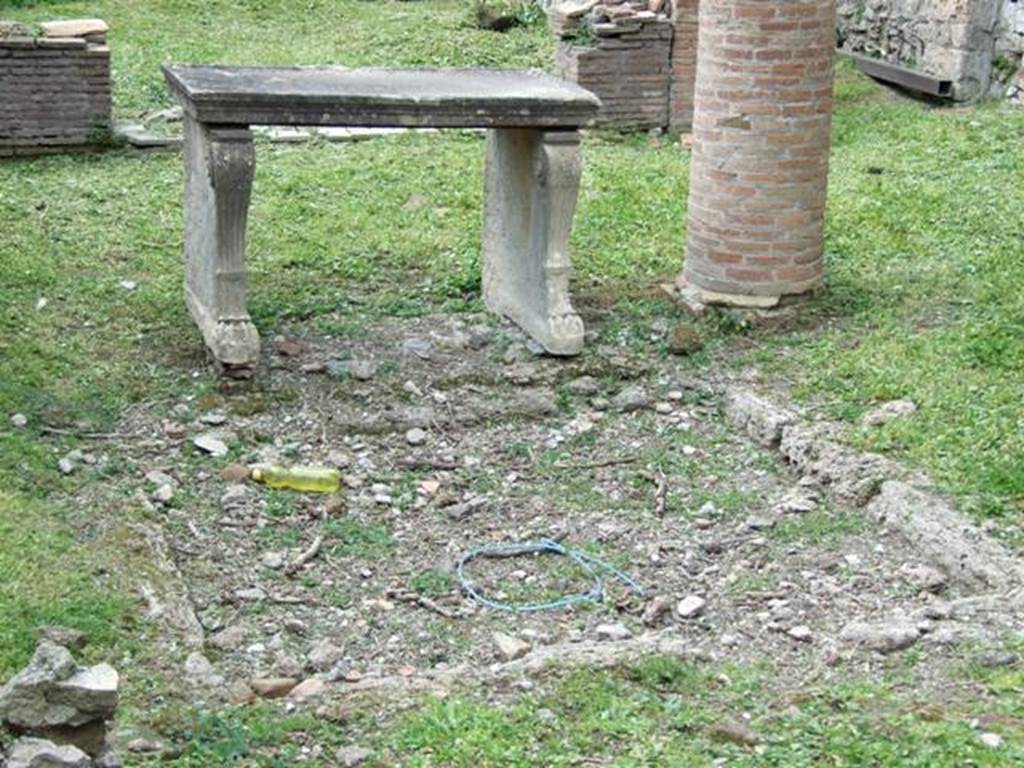 VI.15.6 Pompeii. March 2009.  Room 1. Remains of Impluvium, and table.