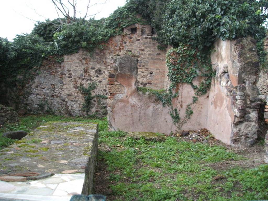 VI.15.16 Pompeii. December 2005. Looking west to north-west corner of bar-room, with doorway to VI.15.18.