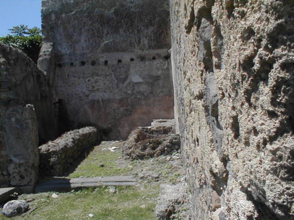 VI.16.4 Pompeii. May 2005. Looking west along north wall, towards VI.16.3.  

