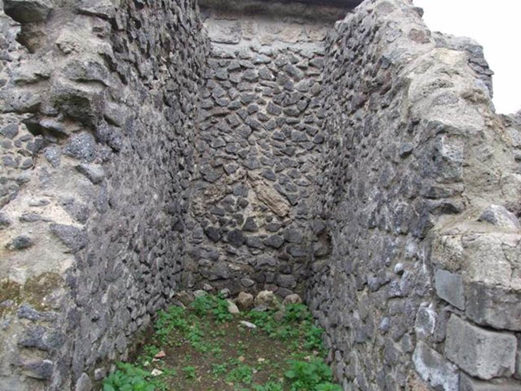 VI.16.8 Pompeii. December 2007. Looking west towards site of staircase to upper floor.
According to NdS, the small entrance room contained the first section of the staircase with five masonry steps. At the top of the masonry steps was a staircase landing in wood supported by the beams.  Above the landing, wooden stairs continued to the upper floor.
At the foot of the stairs was the circular mouth of a terracotta cistern. Found under the landing was a deposit of amphorae. See Notizie degli Scavi di Antichit, 1908, (p.54)
