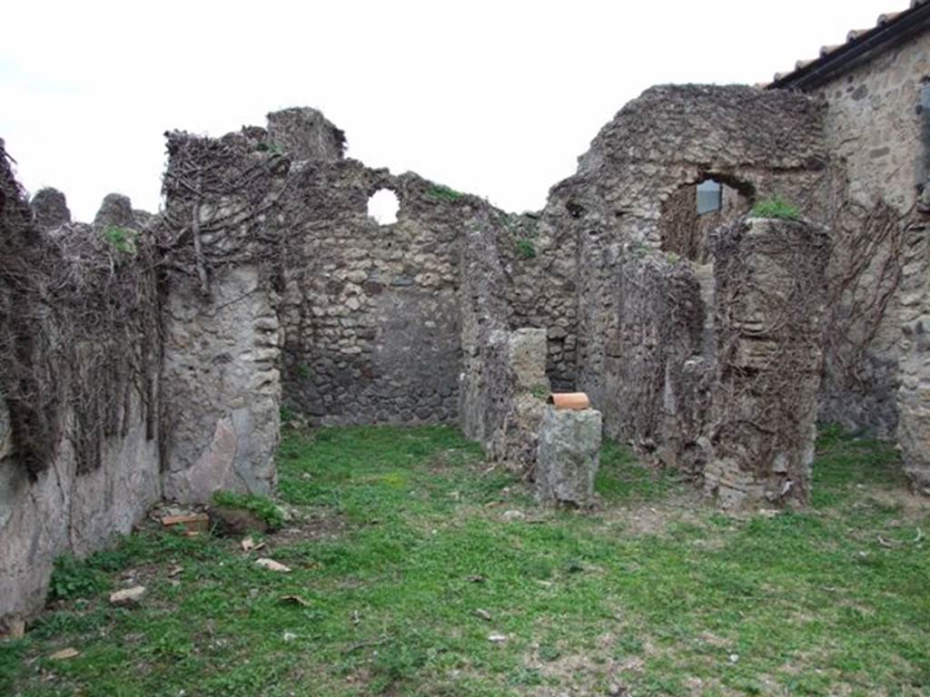 VI.16.13 Pompeii. December 2007. Doorways to three rooms on west side.