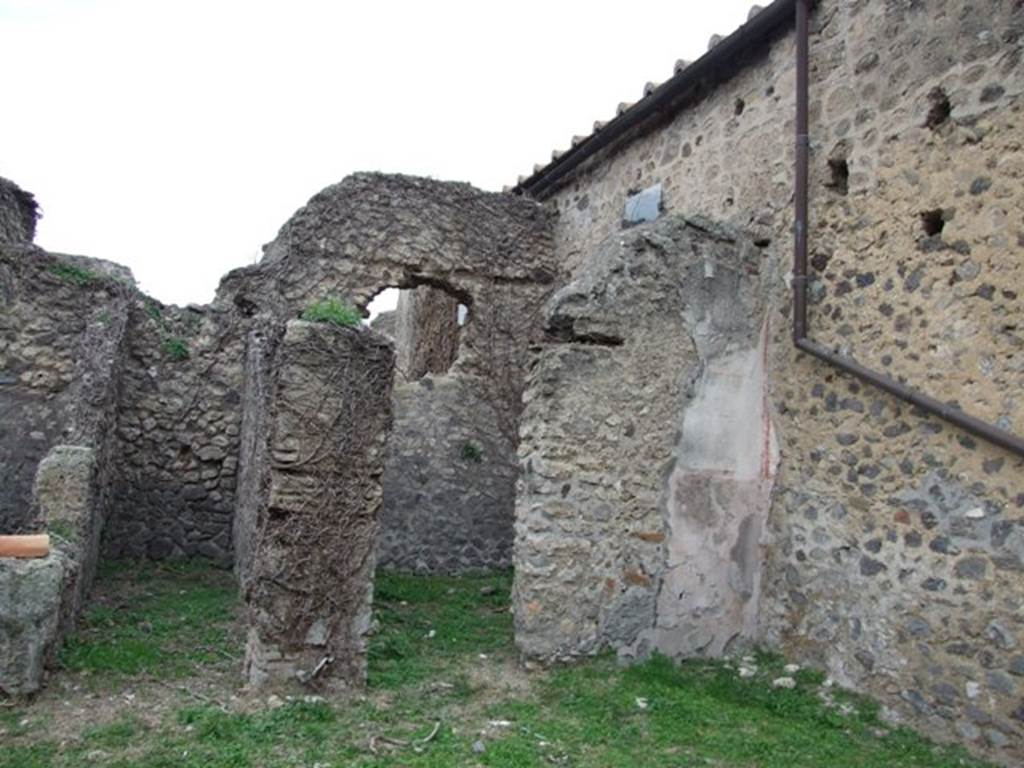 VI.16.13 Pompeii. December 2007. Doorways to rooms in north-west corner. According to NdS, on the northern wall of the workshop was a trace of the wooden staircase that led to the upper floor. This was accessed from VI.16.14. See Notizie degli Scavi di Antichit, 1908, (p.62).