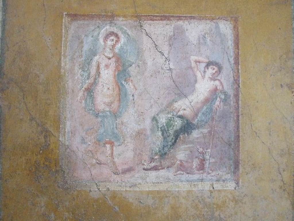 VI.16.15 Pompeii. December 2006.  West wall of room F, with detail of central wall painting of Selene and Endymion. On the right was Endymion, lying on a rock, naked except for a green blanket. At the foot of the rock was a dog with a big collar, looking towards the goddess, barking. The goddess Selene comes from the left, touching the earth with the toes of her sandals. The goddess’s head was surrounded by a red nimbus with white edging. See Notizie degli Scavi, 1908, (p.73)
