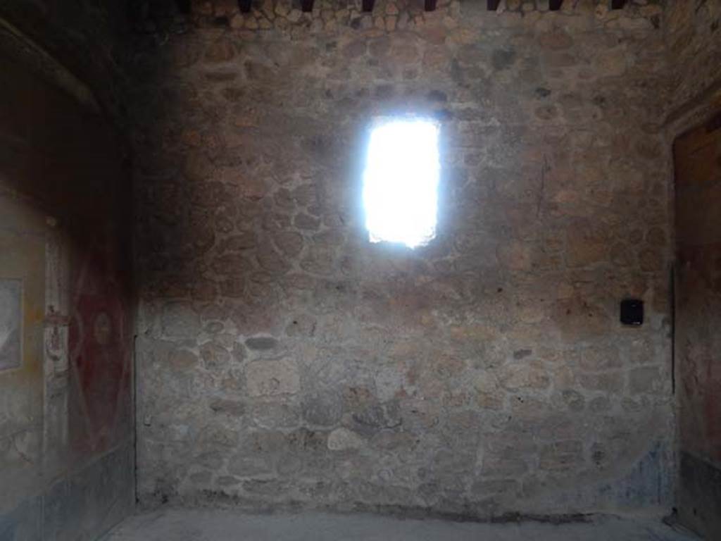 VI.16.15 Pompeii. May 2015. Room F, looking towards rebuilt south wall, which had been entirely destroyed in the eruption. Photo courtesy of Buzz Ferebee.
