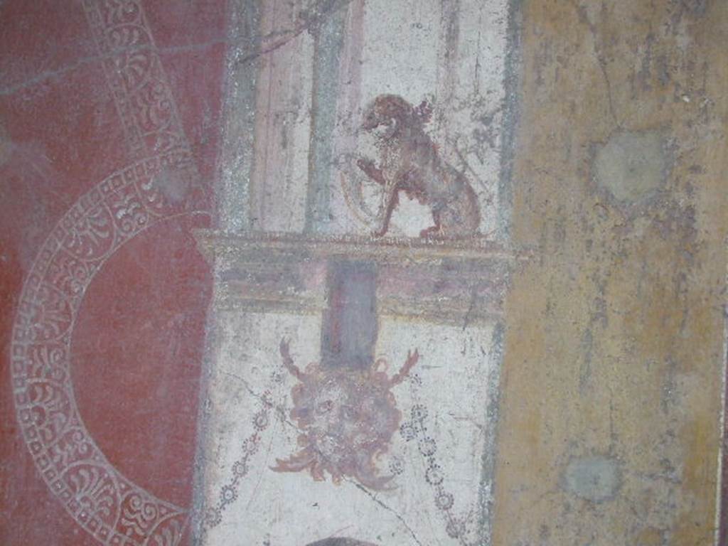 VI.16.15 Pompeii. December 2006. North end of east wall of room F with detail of wall painting of panther and mask of Oceanus.