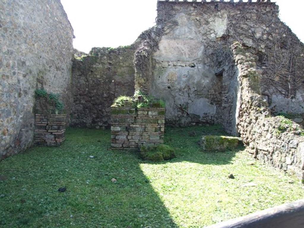 VI.16.18 Pompeii. March 2009. Looking west from entrance across workshop. According to NdS, the workshop itself was rather large with rough walls and concrete floor. In the south-east corner would have been the latrine, and in the north-east corner would have been remains of a small wall that could have been a large ruined hearth. The excavation of this workshop was started on 5th November 1903. See Notizie degli Scavi di Antichit, 1908, (p.180).
