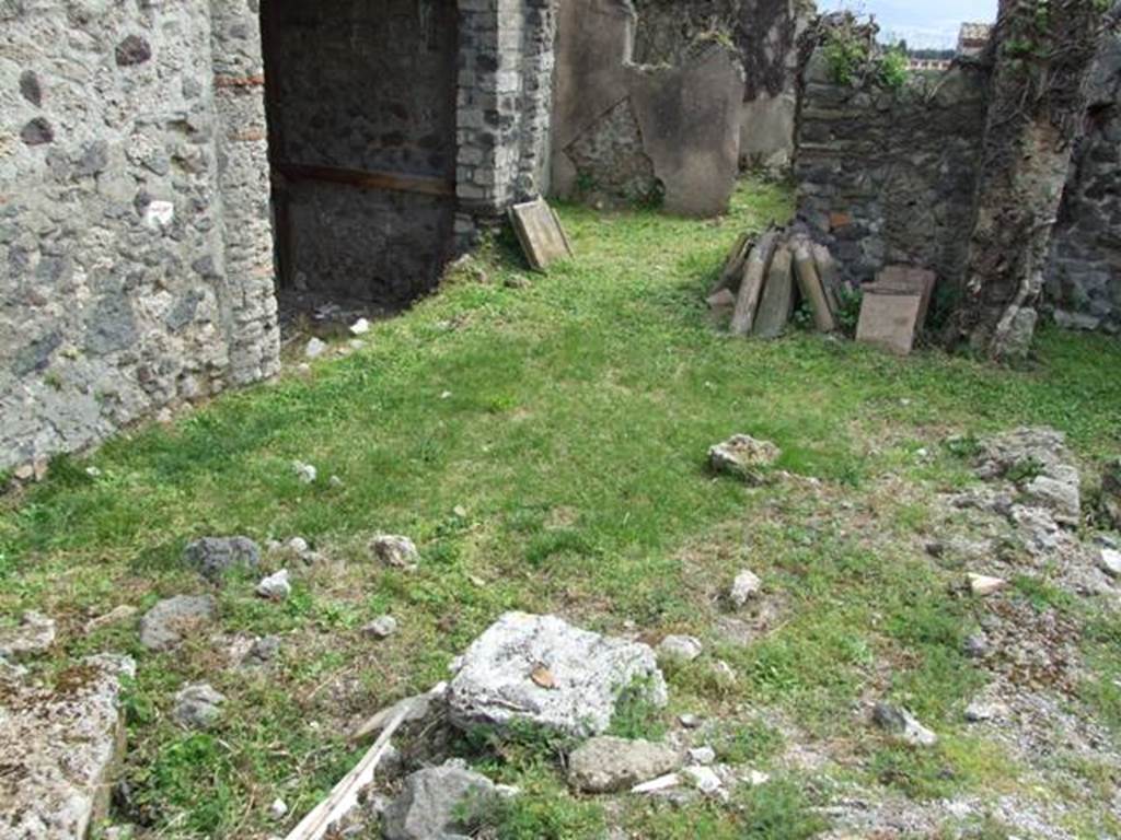 VI.16.29 Pompeii. March 2009. Demolished wall and site of room I, on east side of atrium.   
According to NdS, this room was a rustic room and perhaps may have been uncovered which would have let light into the atrium through the large window. According to Sogliano, high up on the left of the east wall were two semicircular niches. In the middle part of the same wall was a big window. In the south-east corner was a hearth. To the west of the doorway to room H, running north to south, was a small low wall (b) on which were found traces of wood covering. See Notizie degli Scavi di Antichità, 1908, (p. 280). See also Giacobello, F., 2008. Larari Pompeiani: Iconografia e culto dei Lari in ambito domestico.  Milano: LED Edizioni. (p.243).