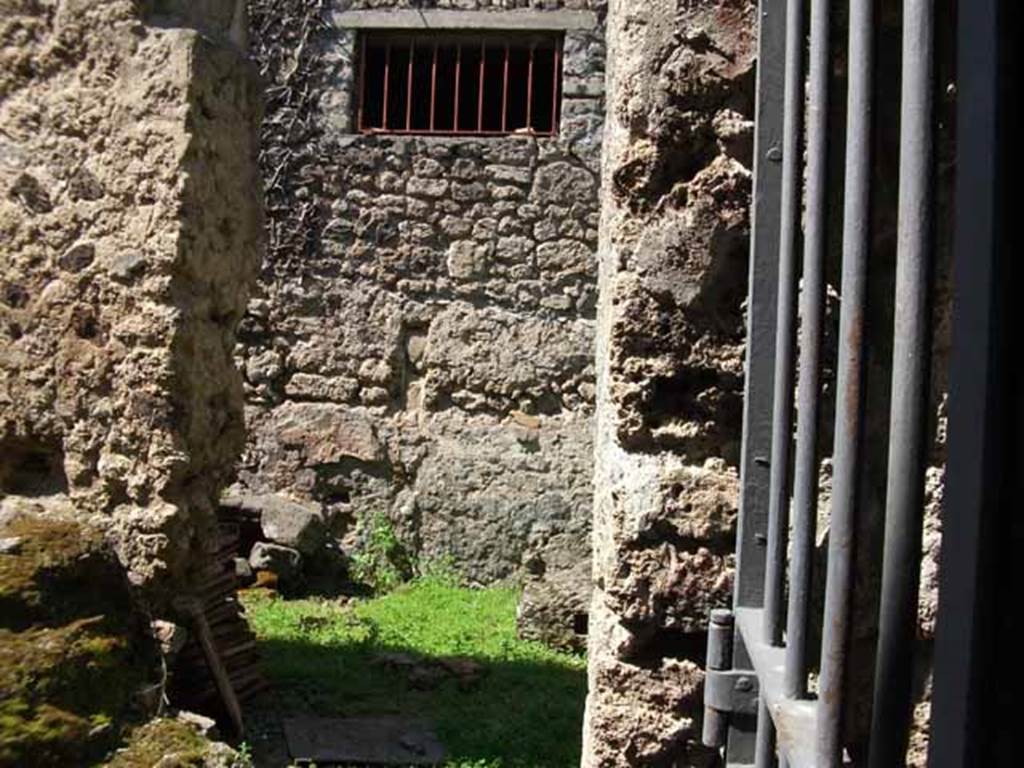 VI.16.7 Pompeii. May 2010. Looking north to doorway to kitchen and latrine.