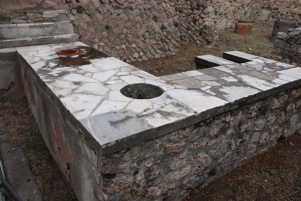 VI.16.40 Pompeii. October 2020. Looking north-east across counter in bar-room towards rear rooms. Photo courtesy of Klaus Heese.