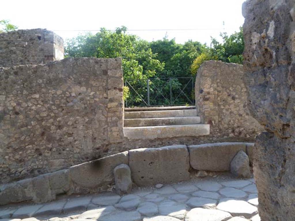 VI.17.10 Pompeii. May 2011. Looking west towards entrance steps and doorway. Photo courtesy of Michael Binns.