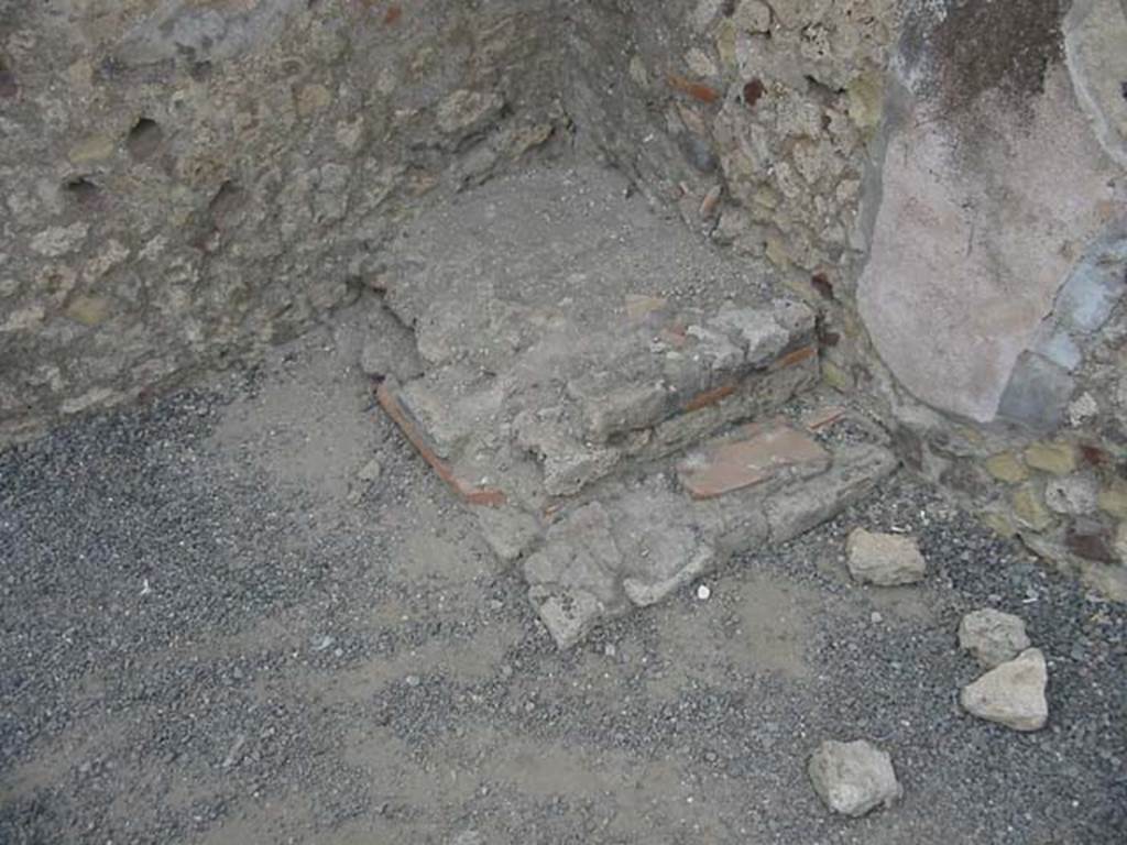 VII.1.1 Pompeii. May 2003. Base of steps in north-east corner. Photo courtesy of Nicolas Monteix.