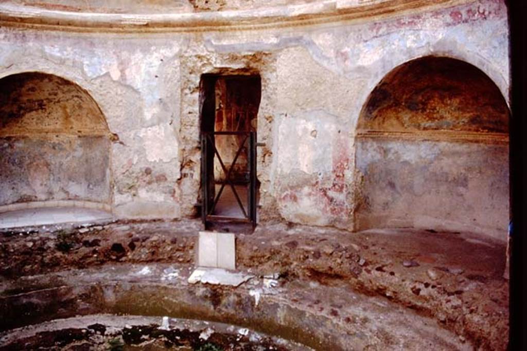 VII.1.8 Pompeii. Looking south towards doorway out of frigidarium 4. 
Source: The Wilhelmina and Stanley A. Jashemski archive in the University of Maryland Library, Special Collections (See collection page) and made available under the Creative Commons Attribution-Non-Commercial License v.4. See Licence and use details.
J84f0014

