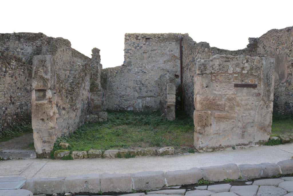 VII.1.19 Pompeii. December 2018. Looking west to entrance doorway on Via Stabiana. Photo courtesy of Aude Durand.