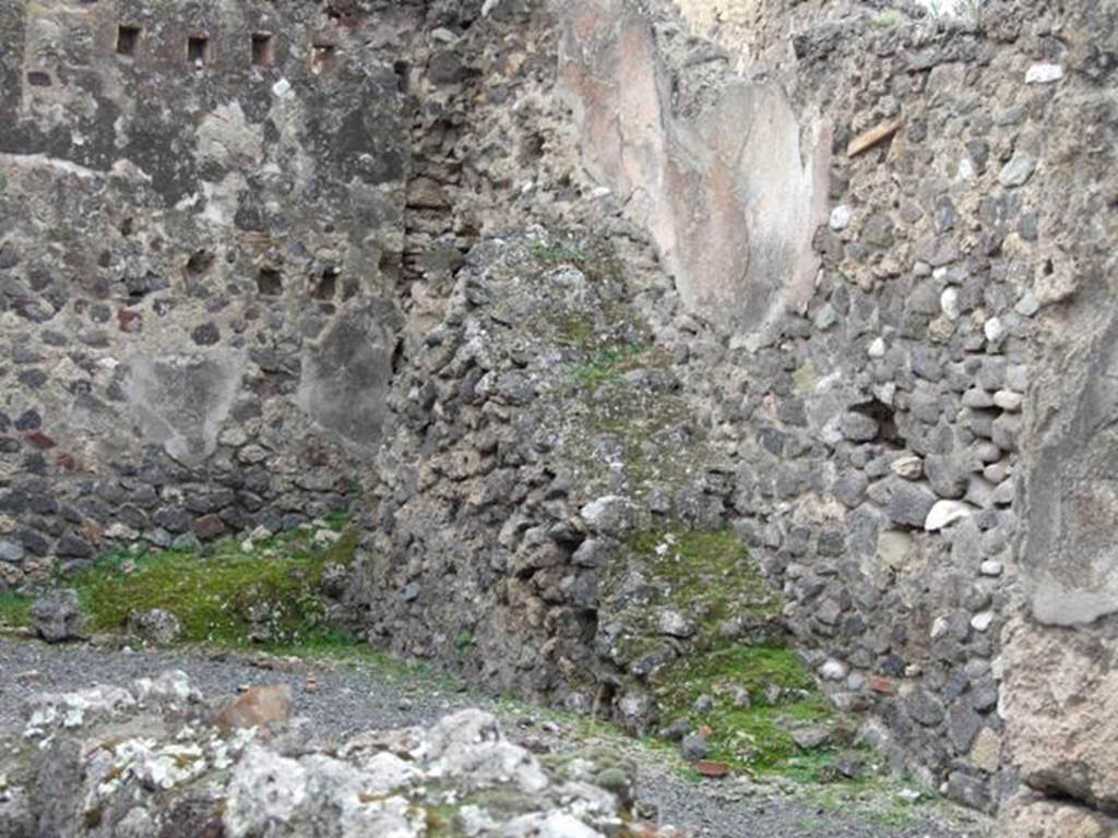 VII.1.22 Pompeii.  House.  December 2007.  Remains of staircase on north wall with latrine underneath at rear.