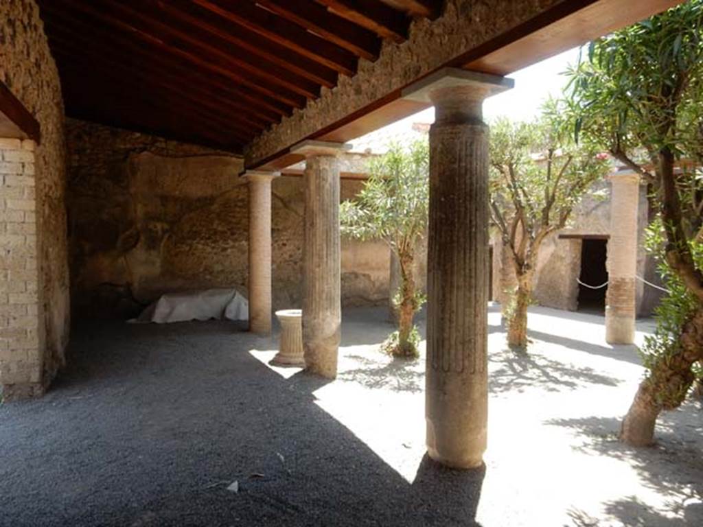 VII.1.25 Pompeii. May 2017. Looking south across peristyle 31 to doorway of room 34.
According to Niccolini this was a cubiculum but PPM simply describes it as a room. 
Photo courtesy of Buzz Ferebee.
See Carratelli, G. P., 1990-2003. Pompei: Pitture e Mosaici: Vol. VI.  Roma: Istituto della enciclopedia italiana, p. 345. 
See Niccolini F, 1854. Le case ed i monumenti di Pompei: Volume Primo. Napoli. Strada Stabiana Casa No. 57, Tav. I.
