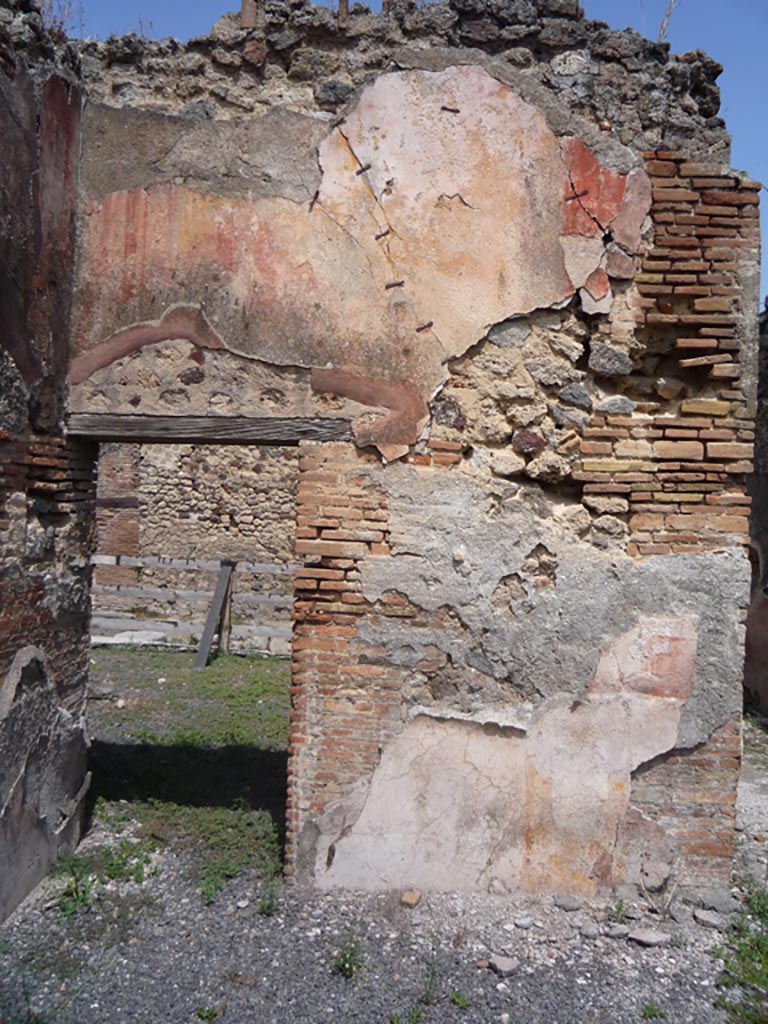 VII.1.36 Pompeii. October 2009. 
Looking towards north-west corner of atrium, with doorway to VII.1.37 in north wall. 
Photo courtesy of Jared Benton.
