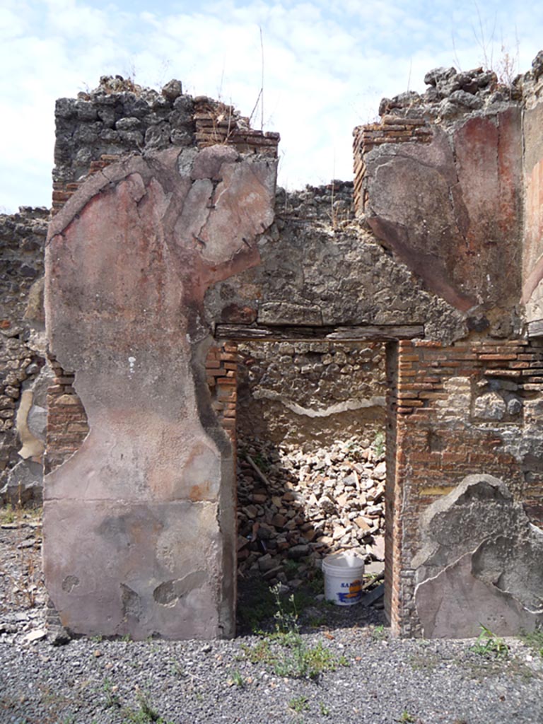 VII.1.36 Pompeii. October 2009. 
Looking west towards doorway to room in north-west corner of atrium. Photo courtesy of Jared Benton.
