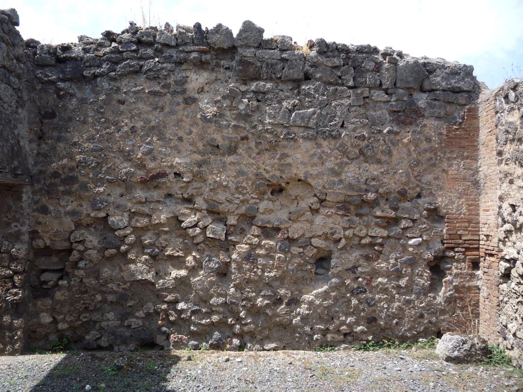 VII.1.36 Pompeii. October 2009. West wall of room on east side of entrance corridor. Photo courtesy of Jared Benton.