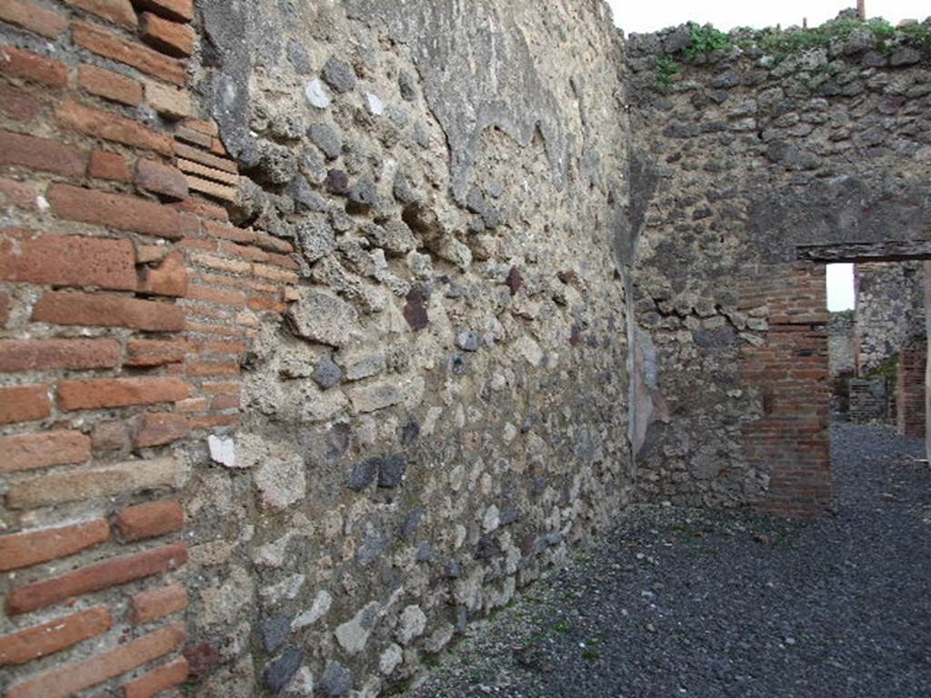 VII.1.37 Pompeii. December 2006. Looking south along east wall of shop.  