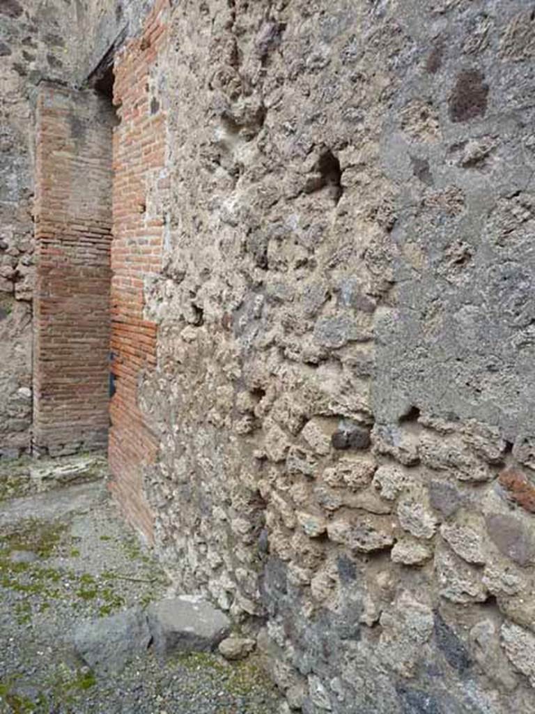 VII.1.46 Pompeii. May 2010. 
East wall of rear room a with entrance to corridor 15.