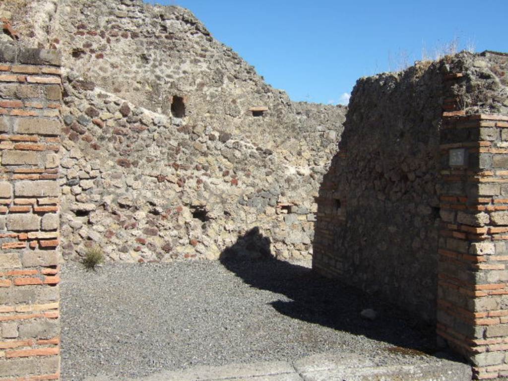 VII.1.53 Pompeii. September 2005. Entrance to shop, looking east.