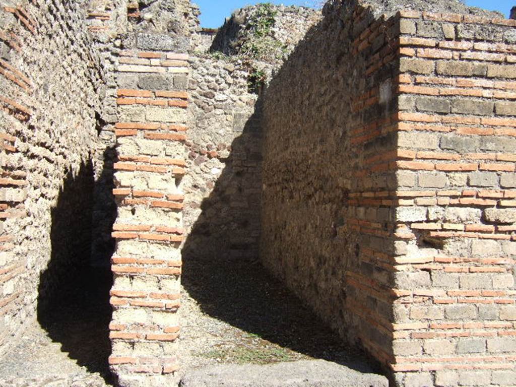 VII.1.59 Pompeii. September 2005. Looking east at site of stairs to upper floor.  

