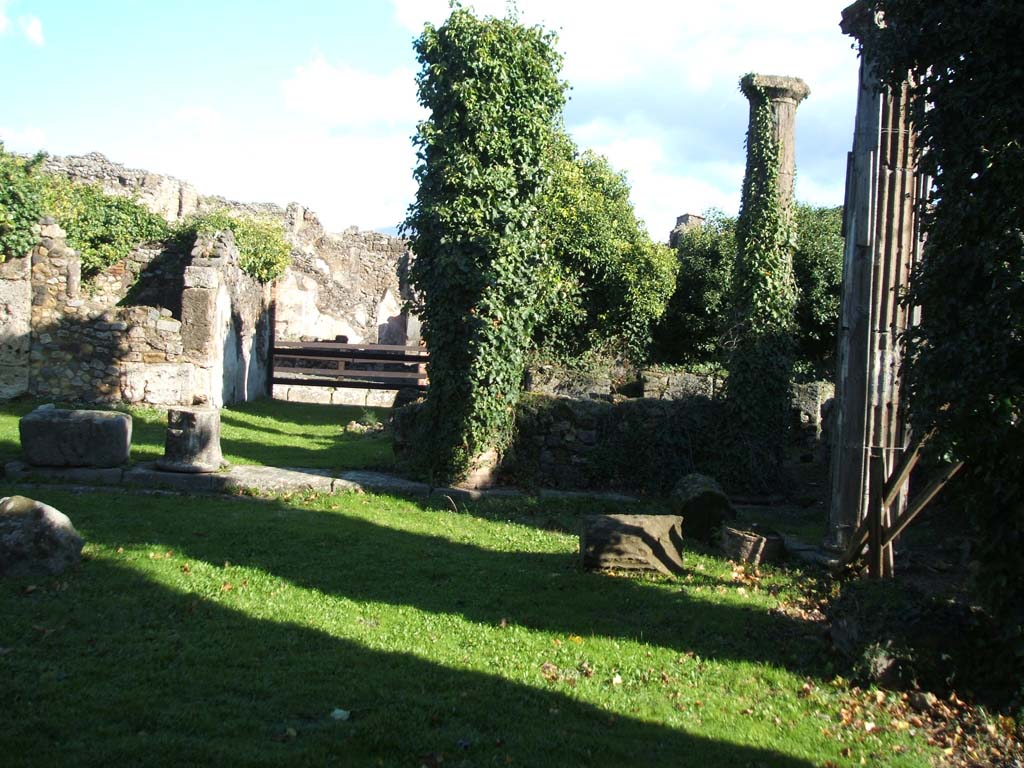 VII.2.11 Pompeii. December 2004. Looking east from peristyle towards entrance and south-east corner.