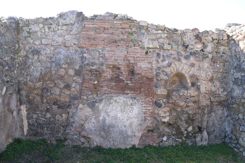 VII.2.12, Pompeii. February 2020. Looking towards west wall with niche. Photo courtesy of Aude Durand.