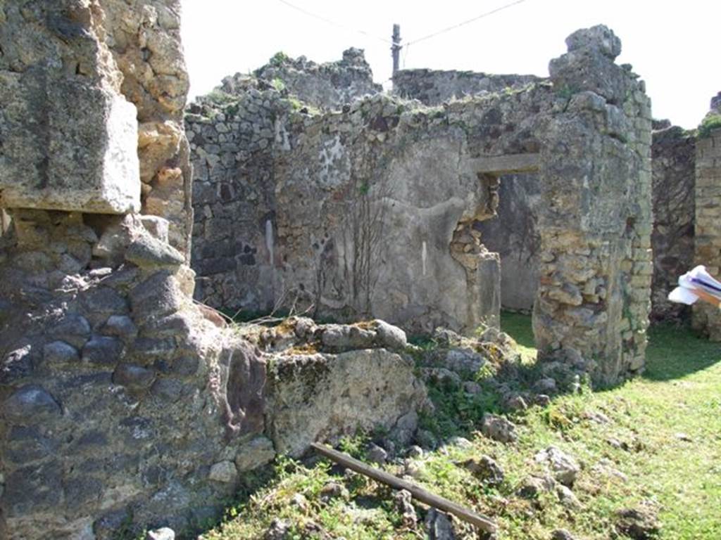 VII.2.16 Pompeii. March 2009. Room 8, oecus, with door through to room 9 in south wall, looking south-east from east portico.