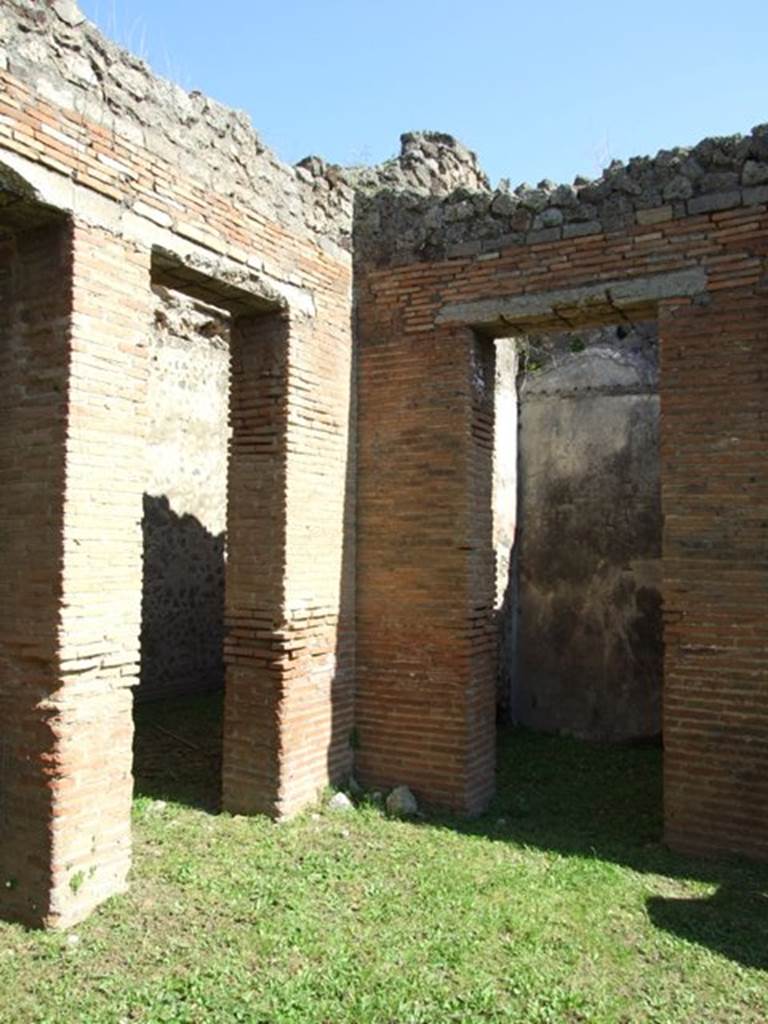 VII.2.18 Pompeii.  March 2009. Doorways to Rooms 2 and 3 in north east corner of atrium.