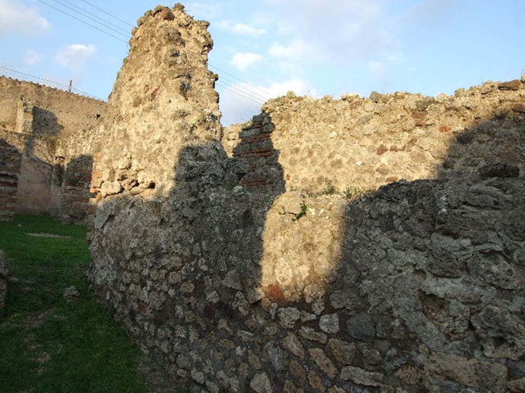 VII.2.37 Pompeii. December 2005. East wall of shop.