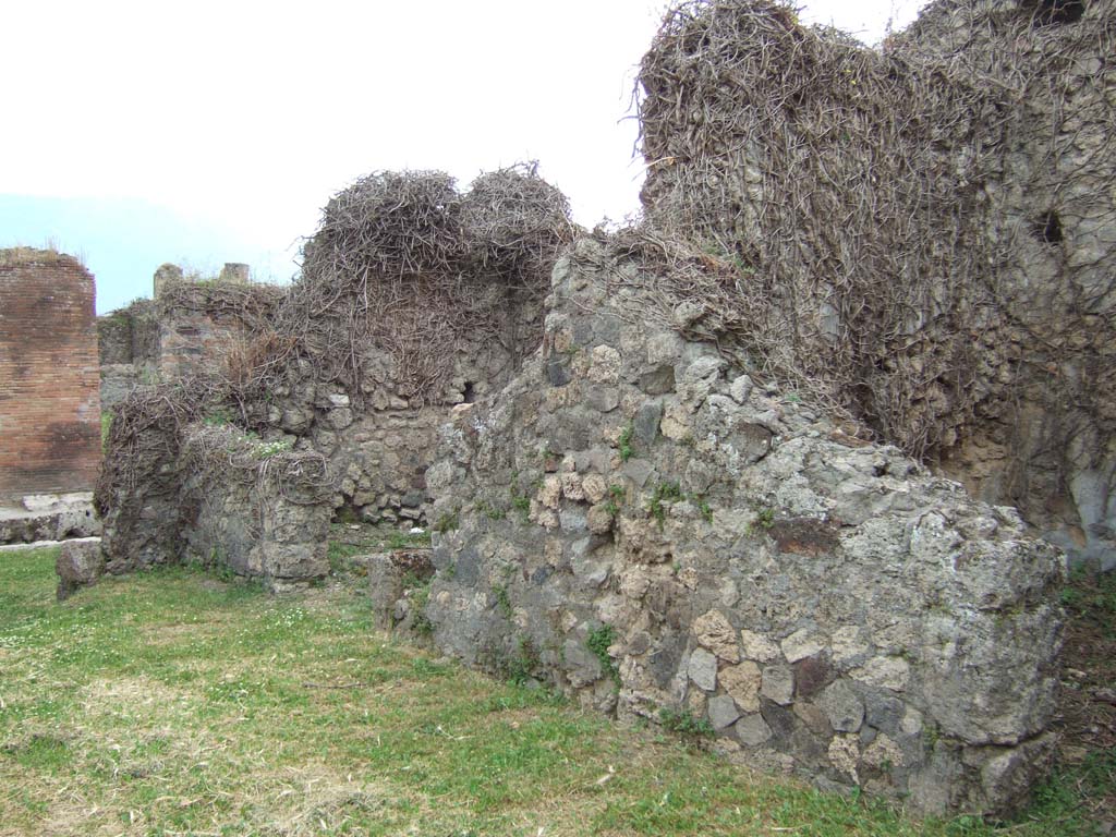 VII.2.38 Pompeii. May 2006. West side of atrium, doorways to two cubicula.