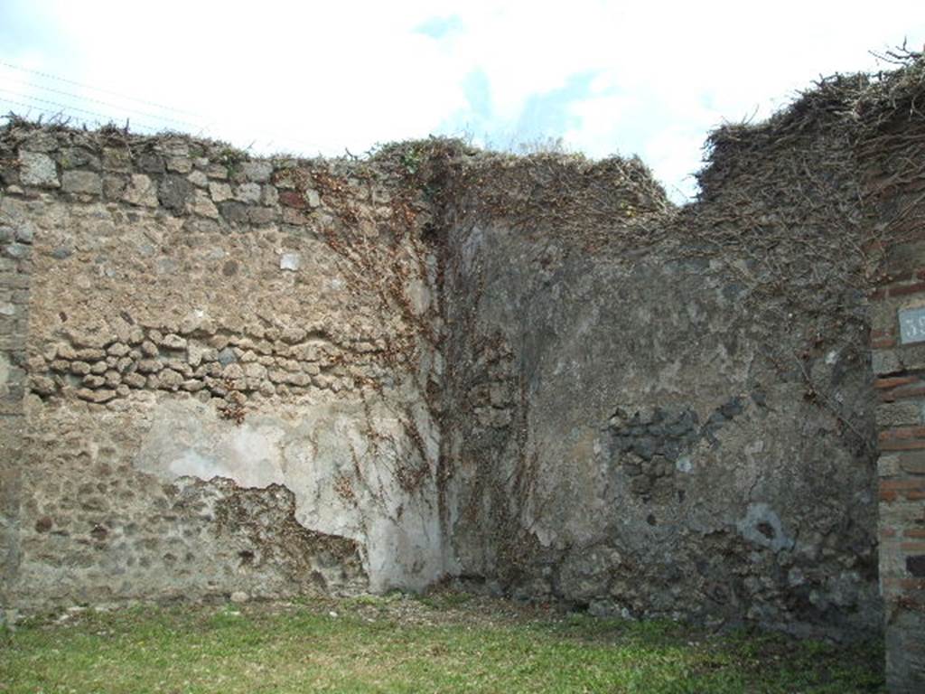 VII.2.39 Pompeii. May 2006. North-east corner of shop.


