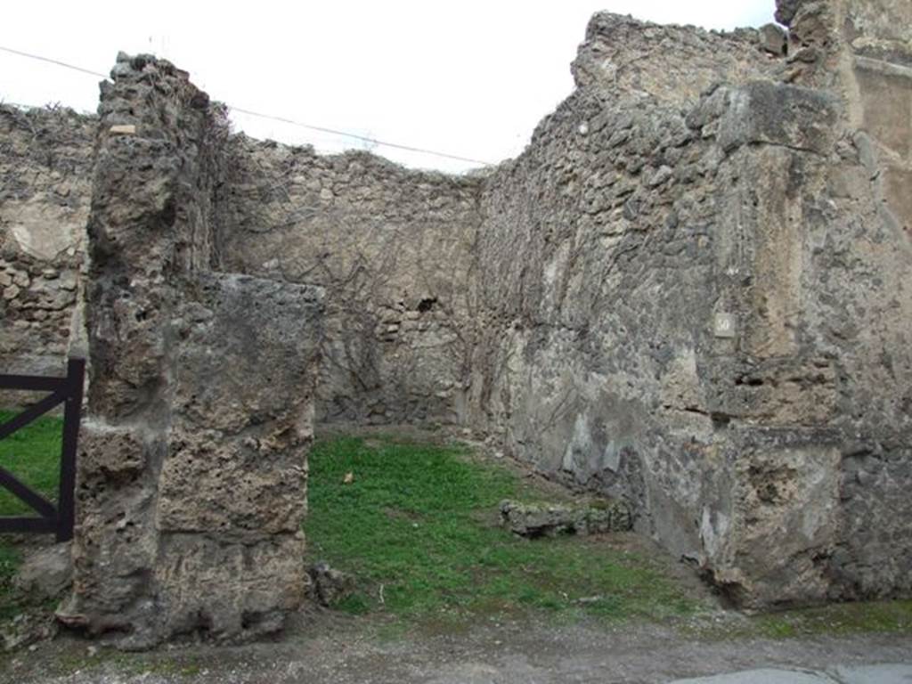 VII.2.50 Pompeii. December 2007. East wall with base for stairs to upper floor.