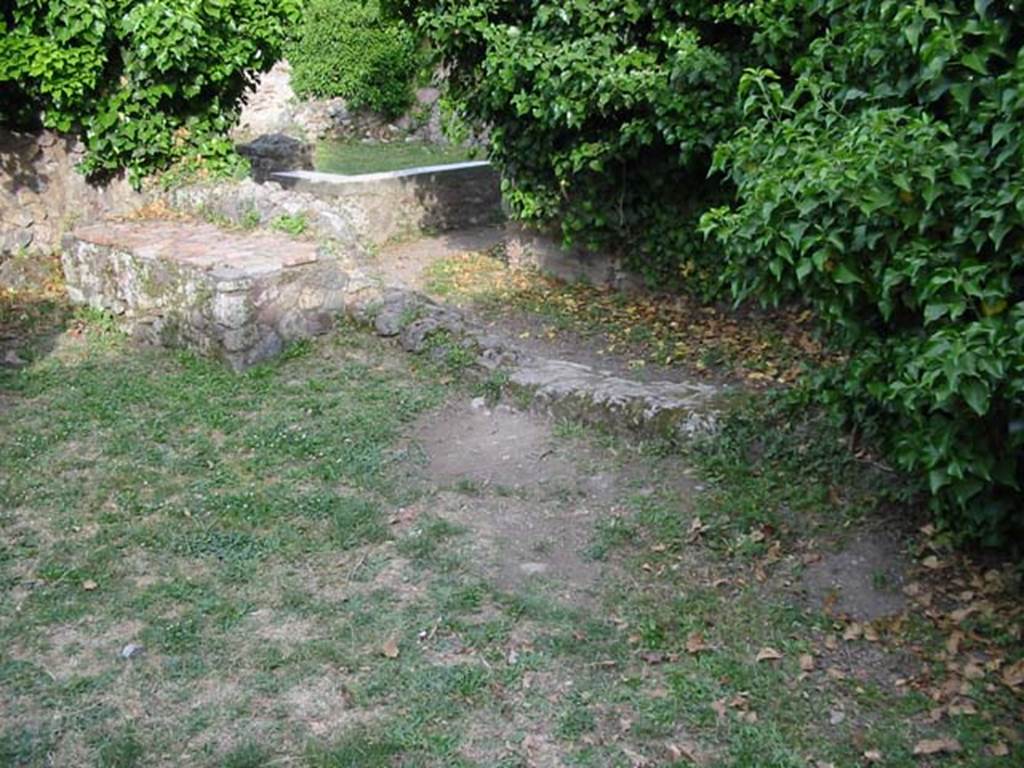 VII.3.1 Pompeii. May 2003. Looking towards bench in kitchen area, and towards rear part of VII.3.3/VII.2.38. Photo courtesy of Nicolas Monteix.
