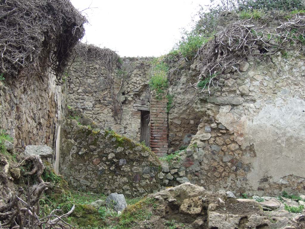 VII.3.13 Pompeii. March 2009. South-west corner of large triclinium. Looking towards remaining west wall of triclinium.