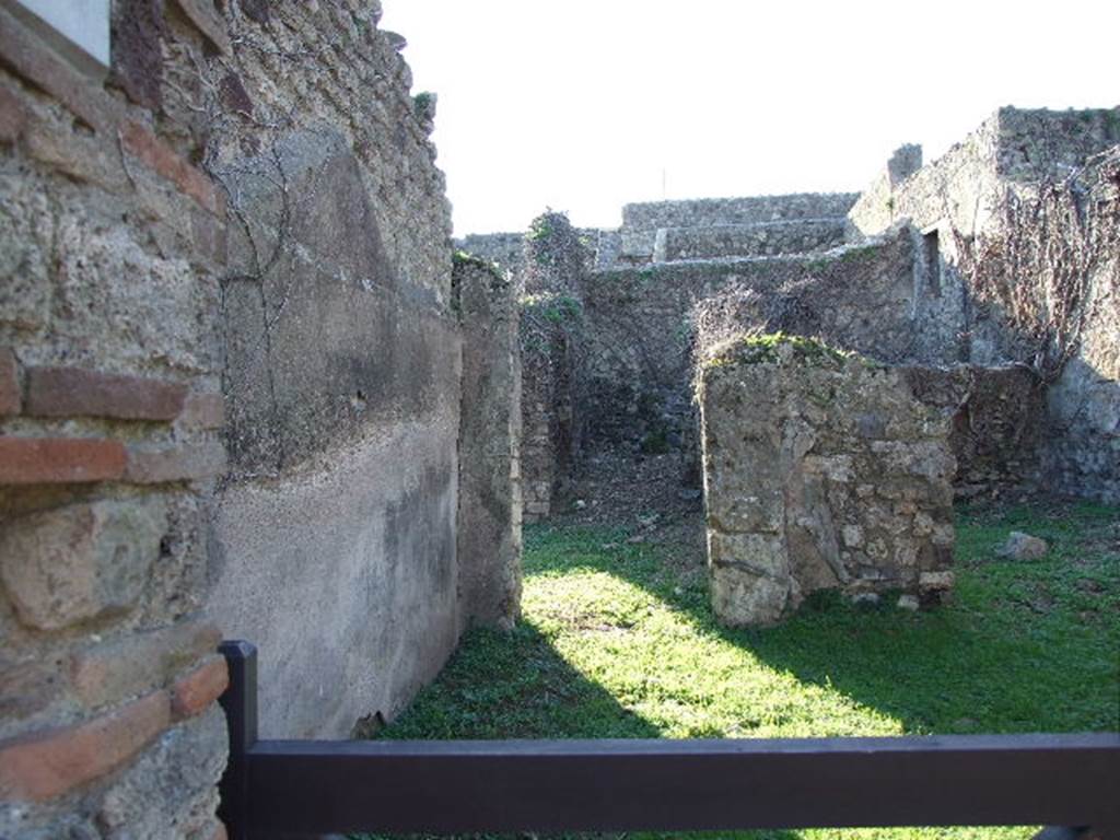 VII.3.22 Pompeii. December 2006. Looking west to corridor to rear rooms and link to VII.3.23.