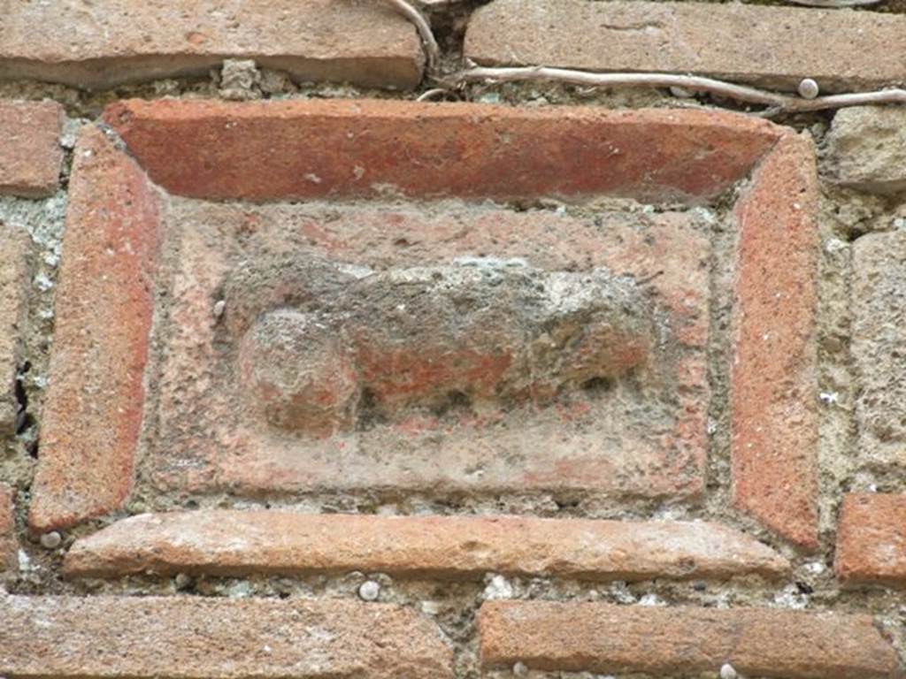 VII.3.23 Pompeii. March 2009. Terracotta and tufa phallus plaque.