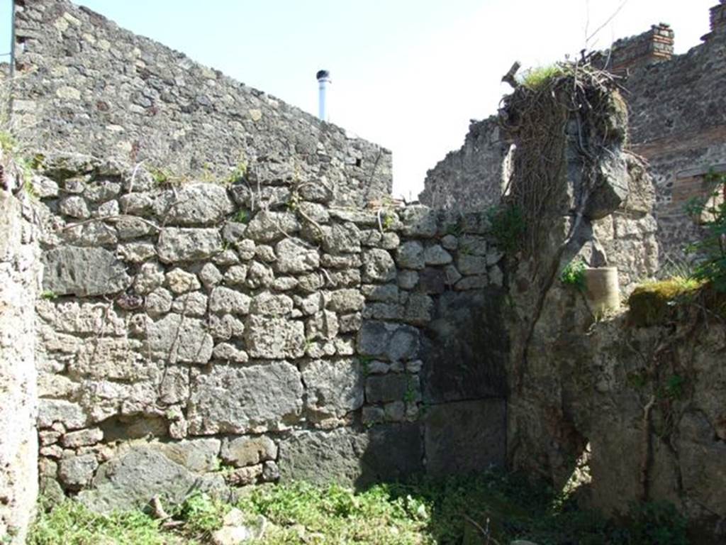 VII.3.29 Pompeii.  March 2009.  Room 15.  East wall of Kitchen, with downpipe in south east corner.