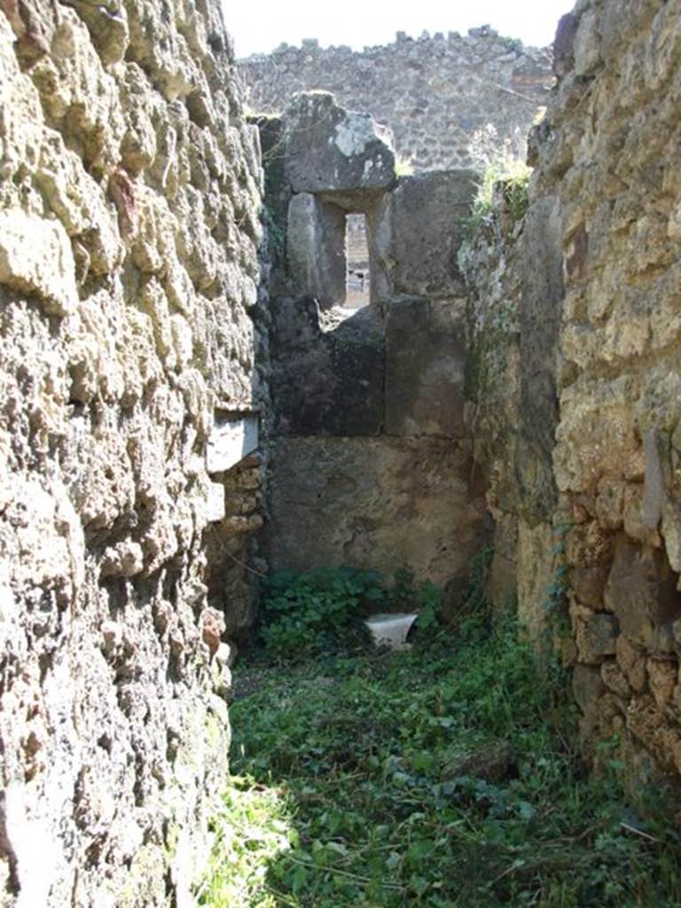 VII.3.29 Pompeii.  March 2009.  Room 16, in foreground, Stairs to upper floor. Iin background, small door from Kitchen to area under stairs.