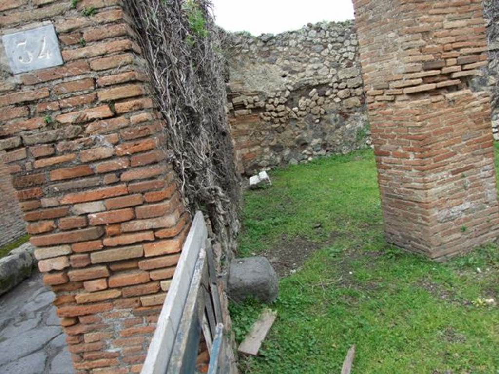 VII.3.34 Pompeii. March 2009. Looking north into room connected to VII.3.35, separated by two brick pilasters.