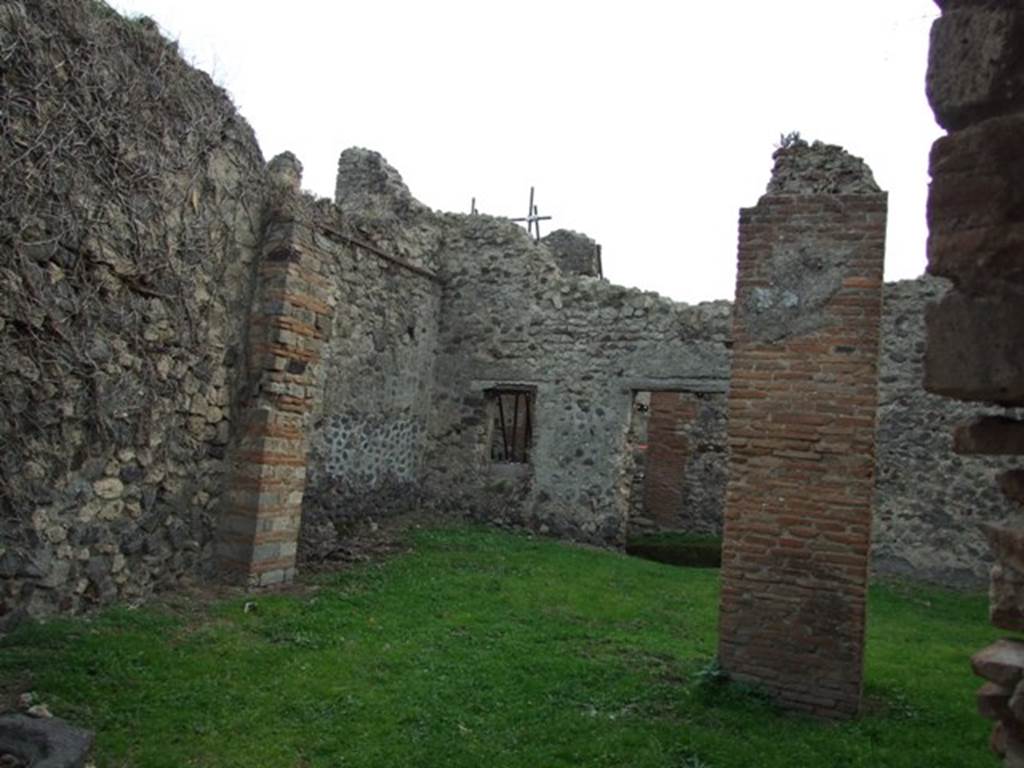 VII.3.35 Pompeii.  December 2007.  Looking south east across VII.3.34 to doorway of VII.3.33 on Vico del Panettiere.