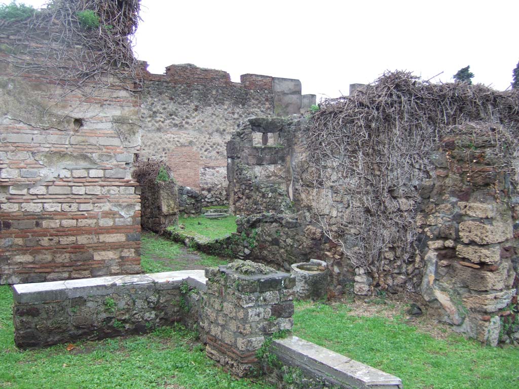 VII.3.38 Pompeii. December 2005. North-west corner of atrium, looking west along entrance corridor.