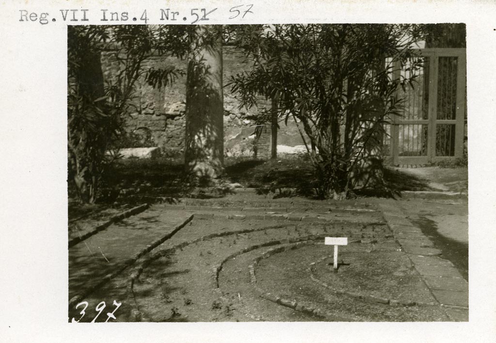 VII.4.31/51 Pompeii, although shown as VII.4.57 on photo. Pre-1937-39. 
Looking north across brick-edged planting bed, towards doorway at VII.4.51, on right.
Photo courtesy of American Academy in Rome, Photographic Archive. Warsher collection no. 397.
