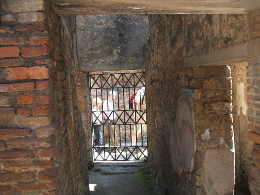 VII.4.43 from inside House of the Ancient Hunt VII.4.48. Looking east. May 2005.
