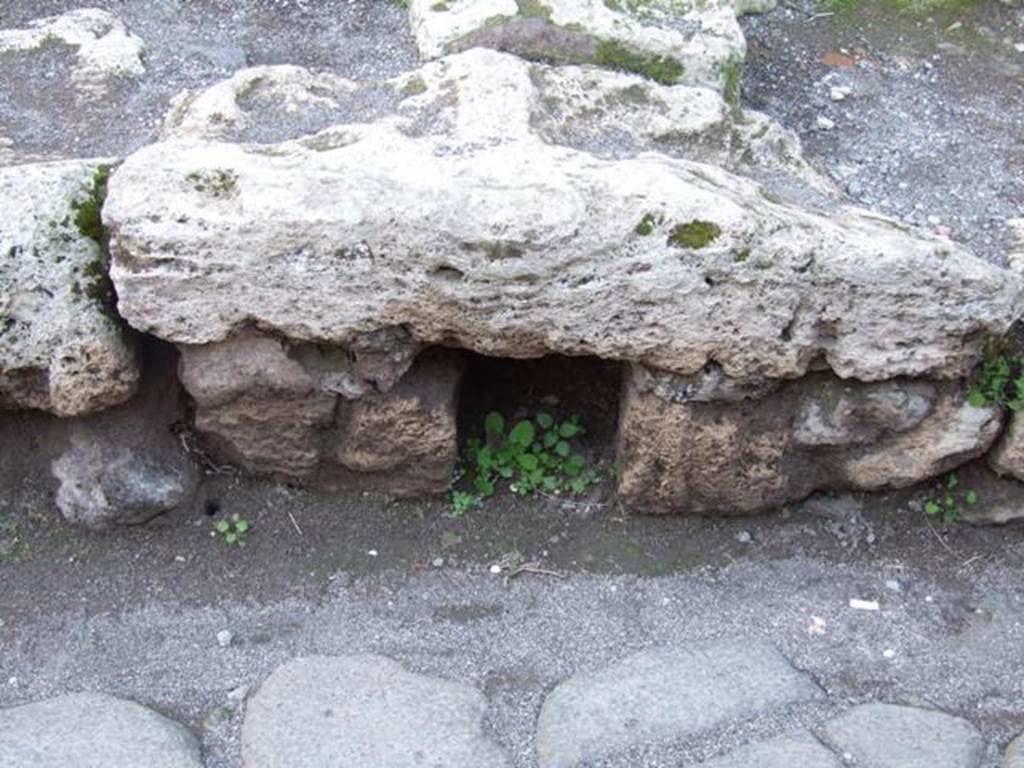 Drainage hole in kerb outside entrance VII.4.43. March 2009.