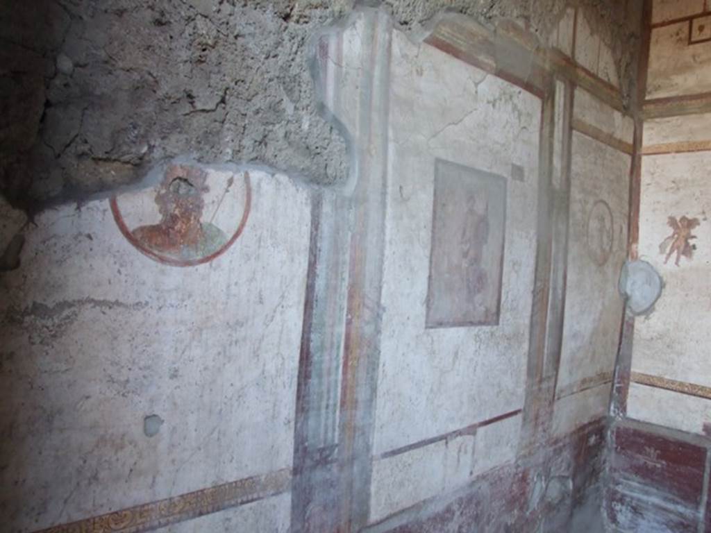 VII.4.48 Pompeii. December 2007. Room 14.  Cubiculum. South wall. 
Partially destroyed wall painting of Zeus, on left. 
