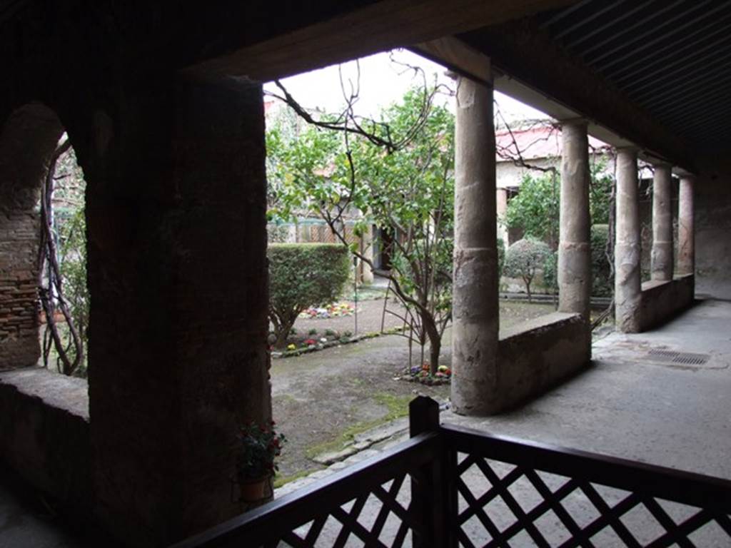 VII.5.24 Pompeii. March 2009.  Looking south west across courtyard (5). The courtyard was enclosed by a portico (7) supported by columns on the west and north, and by brick pillars supporting arches on the east. See Jashemski, W. F., 1993. The Gardens of Pompeii, Volume II: Appendices. New York: Caratzas. (p.183).