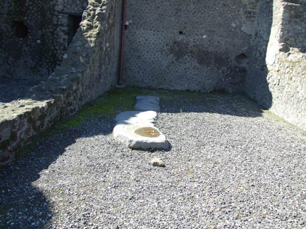 VII.5.26 Pompeii.  March 2009. On the rear (west) wall, there are the remains of the line of the stairs to upper floor.